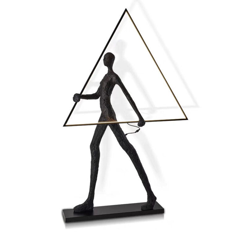 Human Holding Triangle Sculpture